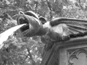 water rushes from a gargoyle's mouth. (google images)
