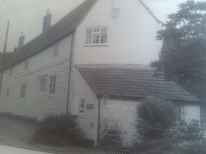 Stoup Cottage, Whissendine. Note the change in bricks from the bottom of the upper windows. At the near end of the cottage before the side porch you can also see on the lower level, the one remaining original window, next to that of the newer building phase. The cottage was originally more than one and these were thatched.
