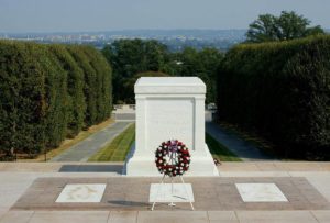 Tomb of the Unknowns. Main pedestal contains the burial of the Unknown Soldier of the Great War, the three "flush" graves are those of the WW2 unknown soldier, the South Korean Unknown Soldier and the now empty tomb of the Vietnam Unknown Soldier.