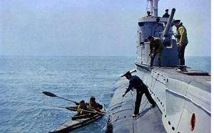 Canoes loading from HMS Tuna