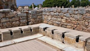 public toilets in Ephesus. Almost next door to this area is the bath house, which is a huge structure with three or four separate rooms. A trip to the baths and public toilets would take up most of the day, and certain people visited the bath-house on certain days. This would involve taking a servant or two, some lunch and so on. Town council members would use this as their opportunity to discuss official business. I did joke to the tour guide that perhaps this was where the term "privy council" came from.... he missed the humour :D